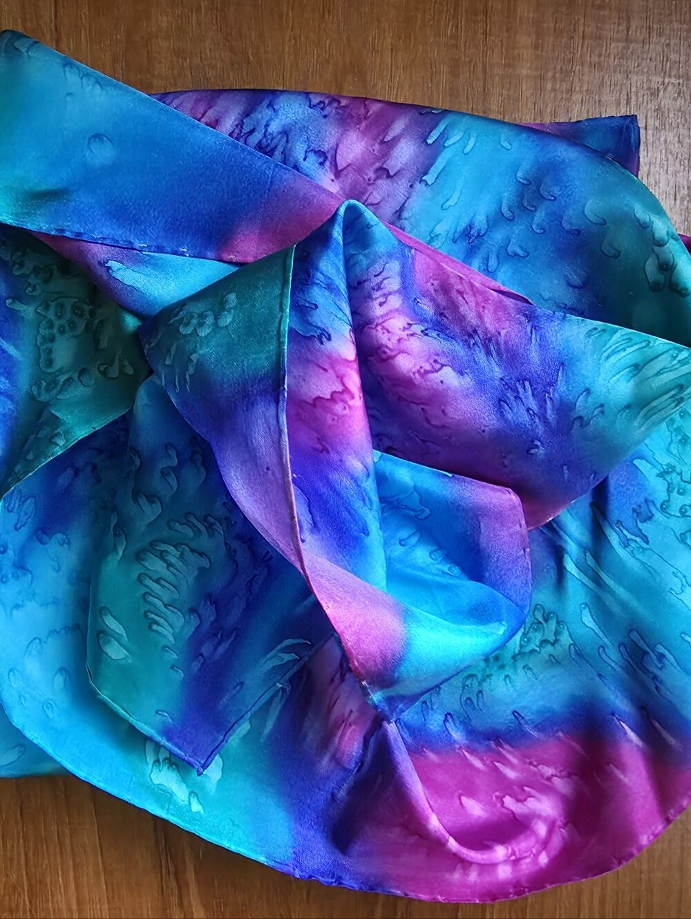 Vibrant Silk scarf hand-painted silk scarf features a fluid abstract blend